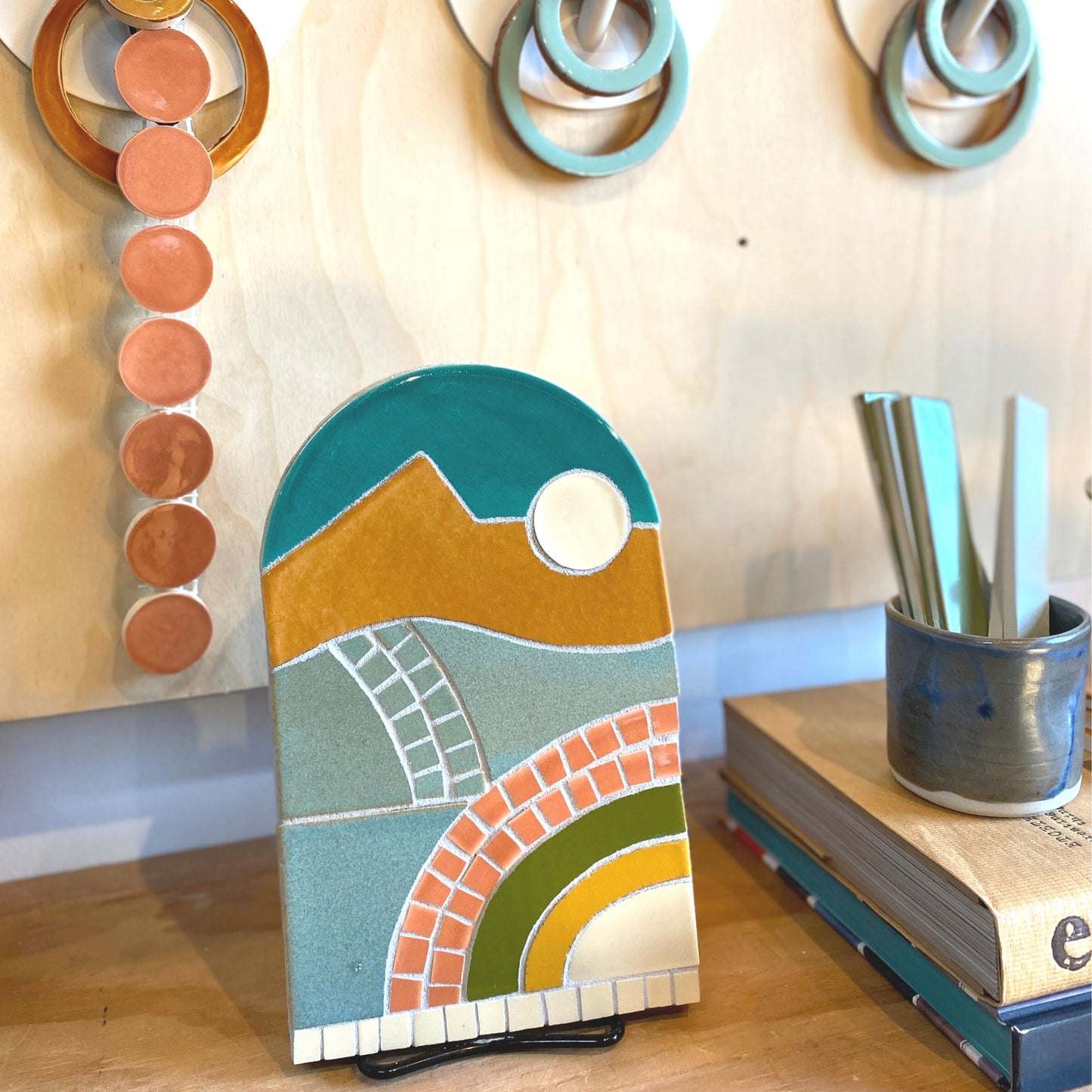 New Day Mosaic Kit in Sahara color way - assembled & styled on a bookshelf