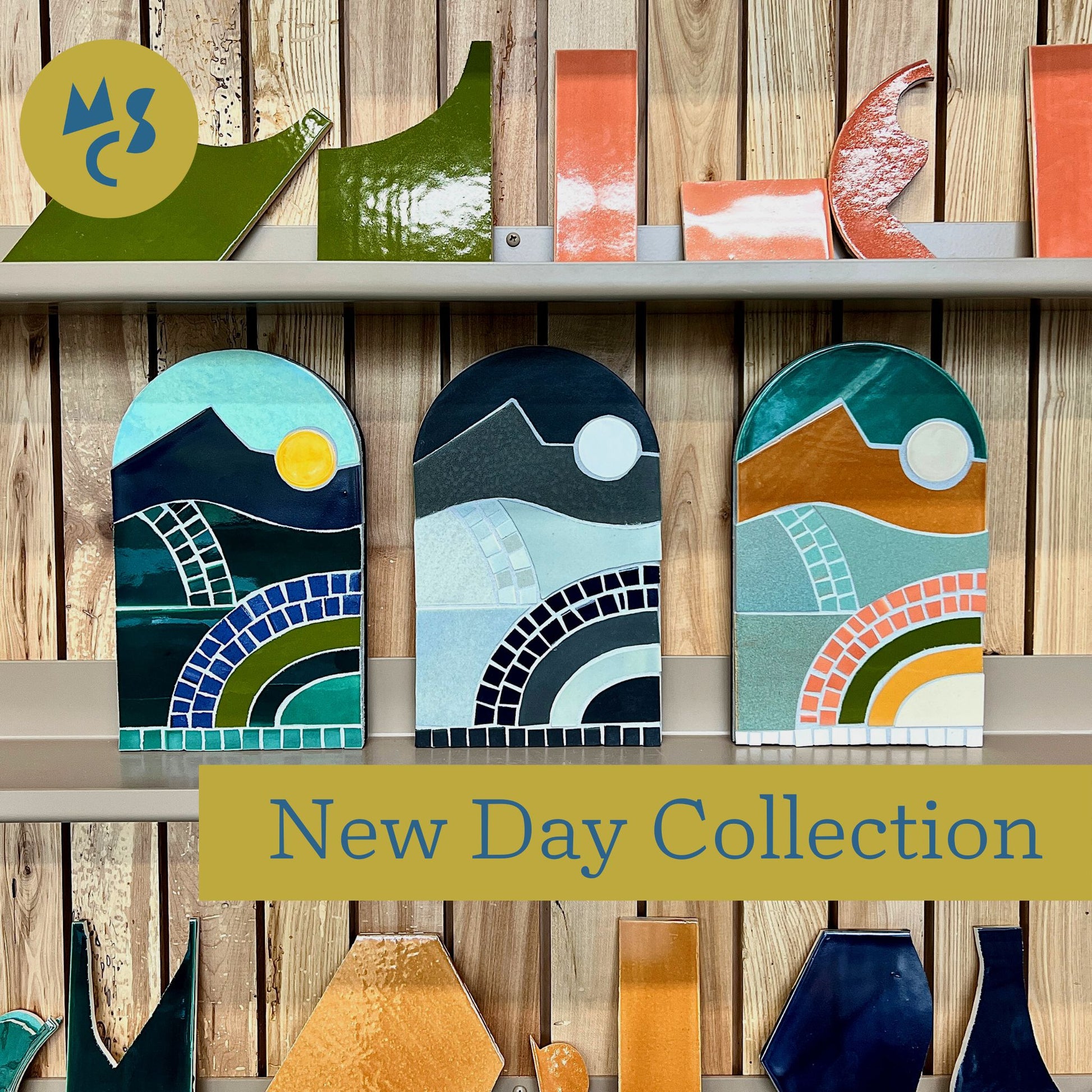New Day Mosaic Kit Collection of all three colors with upcycled tile pieces on shelving